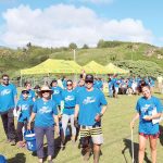 Community of volunteers clean beach